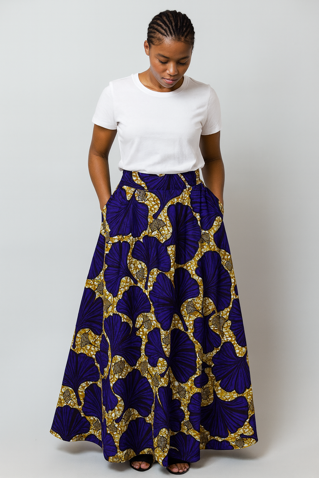 A Shaped Long Ankara Skirt for women with Sequence design.